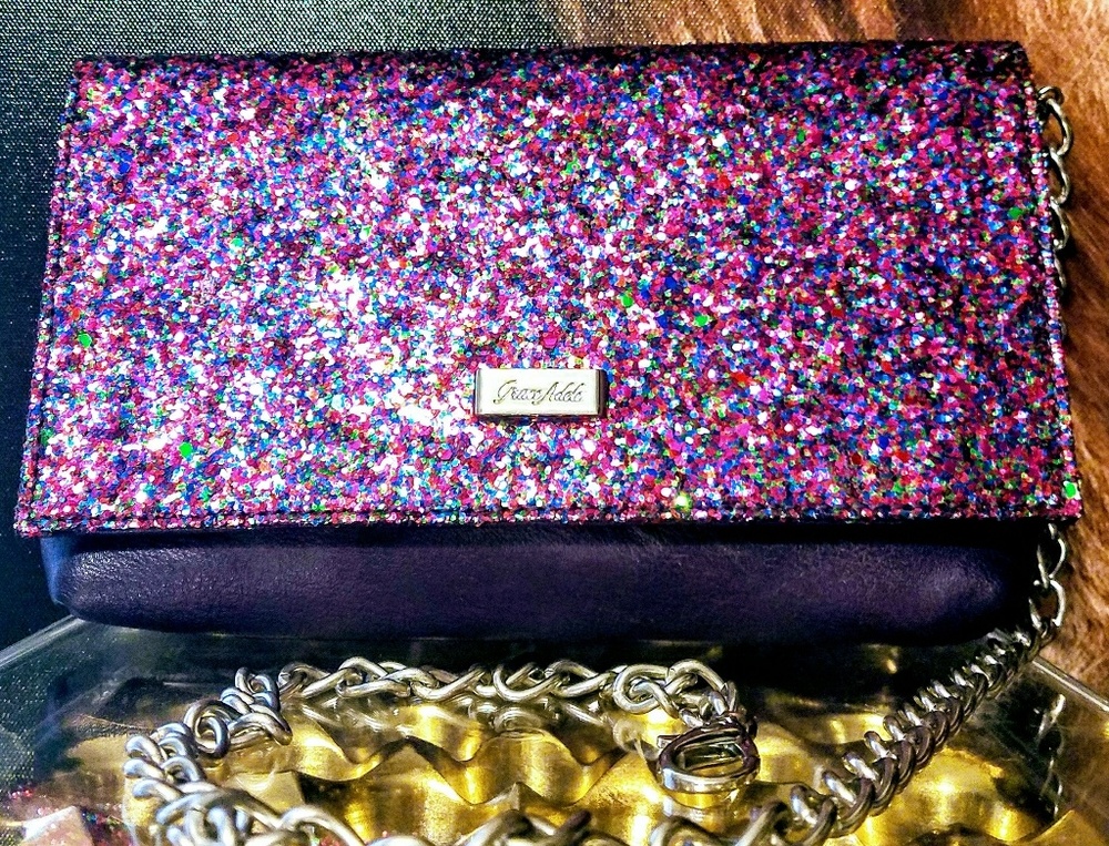 Purpler leather Grace Adele clutch.